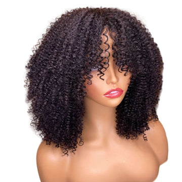 Mannequin head with a curly black wig on a beige background