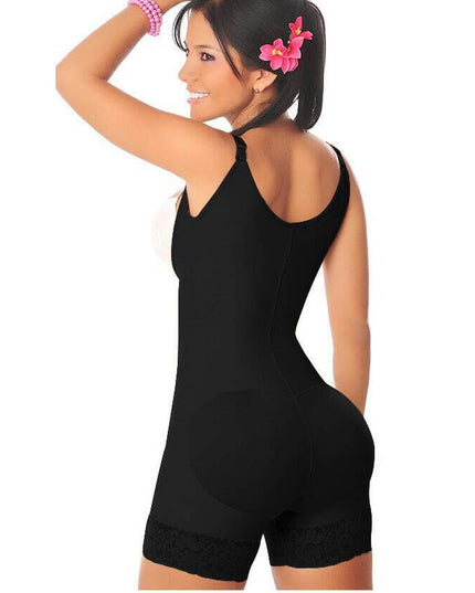 Woman modeling a black full body shaper bodysuit with a floral hair accessory, showcasing a smooth silhouette.