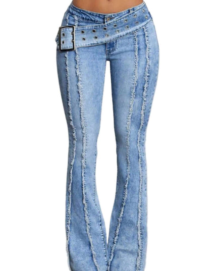 Flared jeans with decorative belt on a plain background