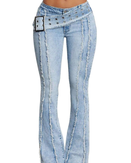 Light blue jeans with decorative belt and stitching on a neutral background
