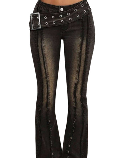 Black flared jeans with a studded belt on a neutral background