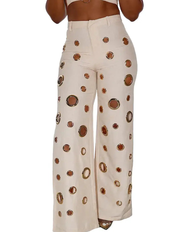Beige outfit with brown circular patterns on a white background