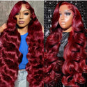 Stylish human hair wigs in vibrant red with soft, luscious waves, perfect for any occasion.