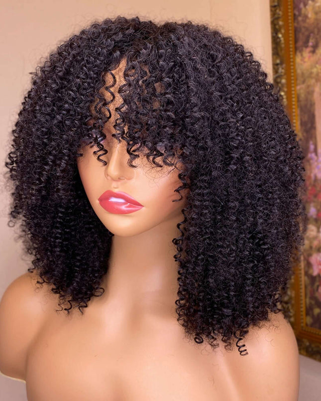 Mannequin head with a black curly wig against a neutral background