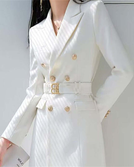 White blazer with gold buttons on a plain background