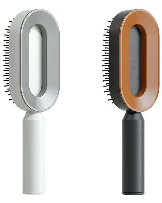 Two pet grooming brushes with different color handles on a white background