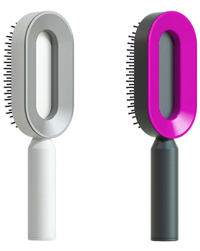 Two grooming brushes, one gray and white, the other pink and gray, on a white background.