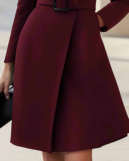 Elegant midi dress with belt, showcasing a flattering high waist design and rich burgundy color.