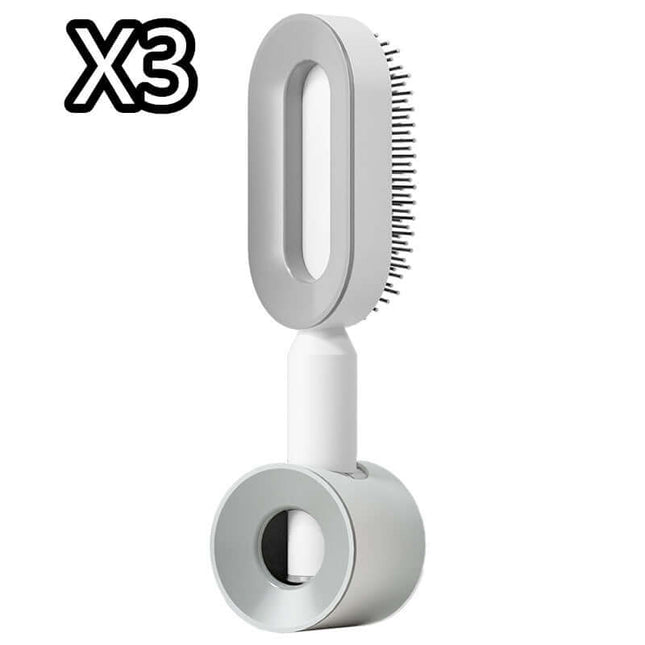 White grooming tool with bristles on a white background, featuring the number 'X3'.