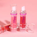 Lip Mirror Liquid Lipstick in two shades, featuring a pumper design on a pink background.