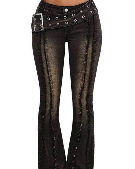 Black flared jeans with a studded belt on a neutral background
