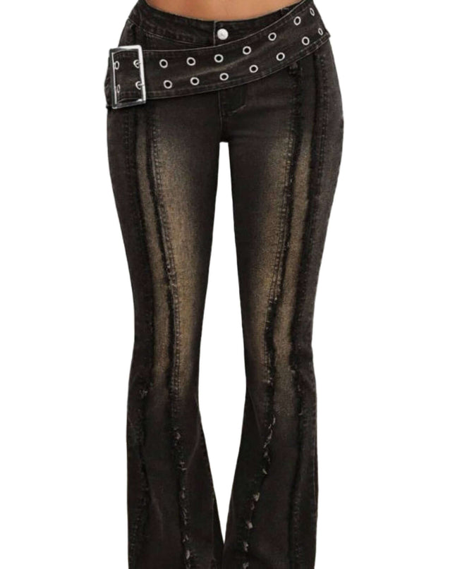 Black flared jeans with a studded belt on a neutral background