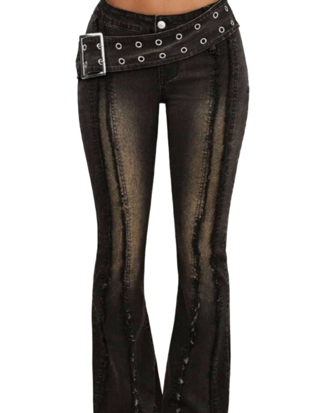 Black flared jeans with a studded belt on a neutral background
