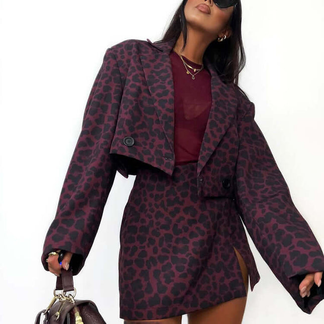 Person wearing a leopard print outfit with a white background
