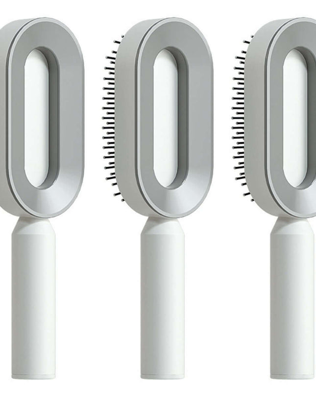 Three white grooming brushes with bristle heads on a white background