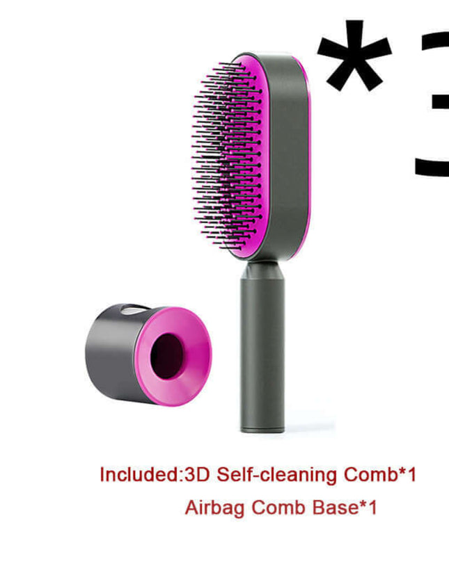 Hairbrush with pink bristle head and gray base on a white background