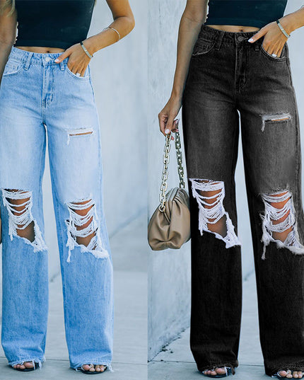 Two pairs of wide-leg jeans with distressed details worn by a person against a light gray background.