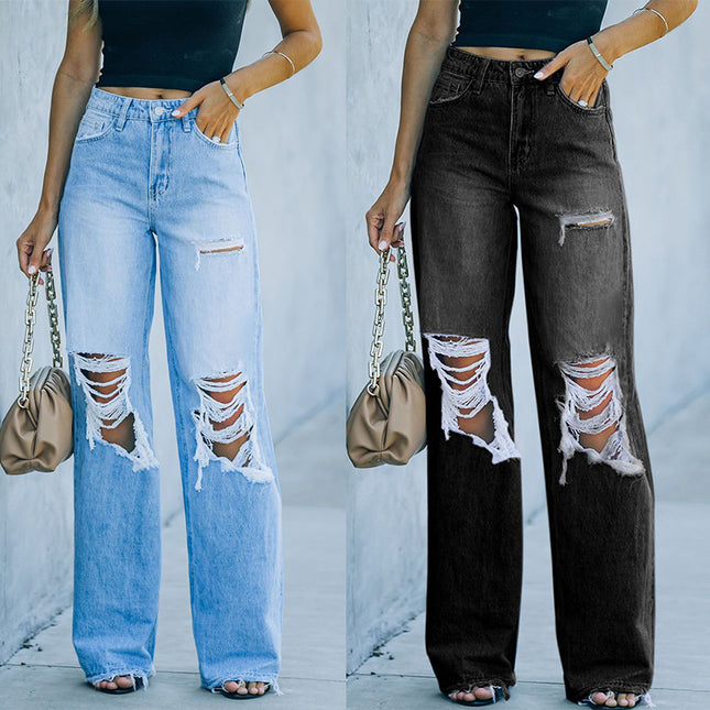 Two pairs of wide-leg jeans with distressed details worn by a person against a light gray background.
