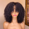 Mannequin head with a curly wig on a beige background