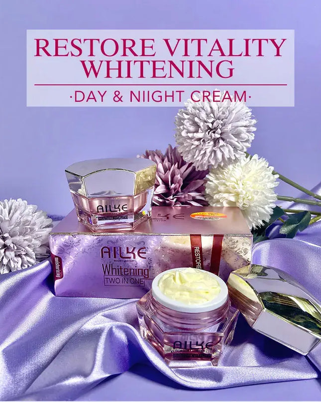 AILKE Restore Vitality Whitening Day and Night Cream jars displayed on luxurious fabric with flowers in a vibrant setting.