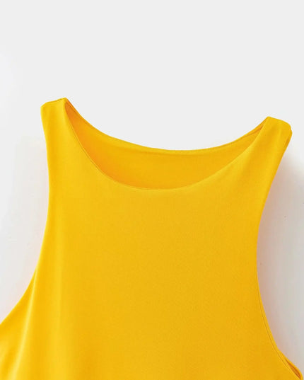Yellow sleeveless top on a white background