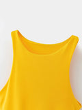 Yellow sleeveless top on a white background