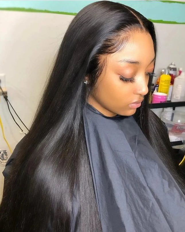 Woman with long black hair in a salon setting