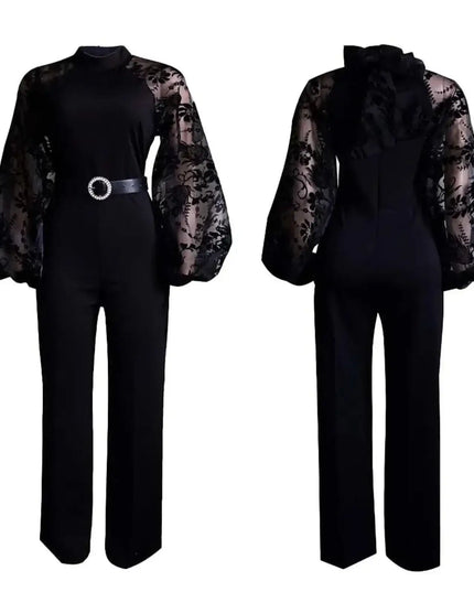 Black jumpsuit with sheer sleeves on a white background