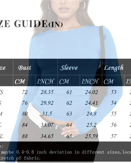 Size guide for women's long sleeve crop top with measurements for XS to XL in inches and centimeters.