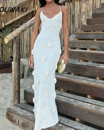 Gothic embroidered dresses for women by KADUWAKI, featuring a slim fitting design with floral accents, ideal for beach vacations.