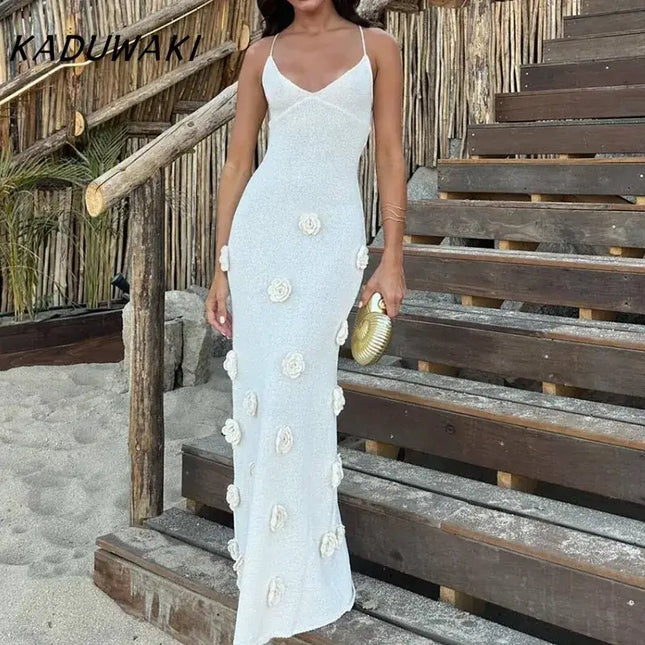 Gothic embroidered dresses for women by KADUWAKI, featuring a slim fitting design with floral accents, ideal for beach vacations.