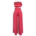 Stylish women's solid two-piece outfits featuring a strapless top and wide-leg pants in vibrant pink color.