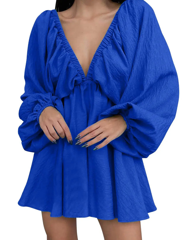 Blue dress with long sleeves on a white background