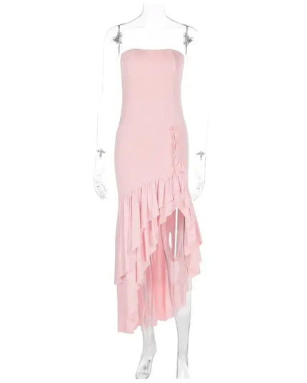 Sexy strapless summer dress in pink with ruffled asymmetrical hemline, perfect for spring and summer occasions.