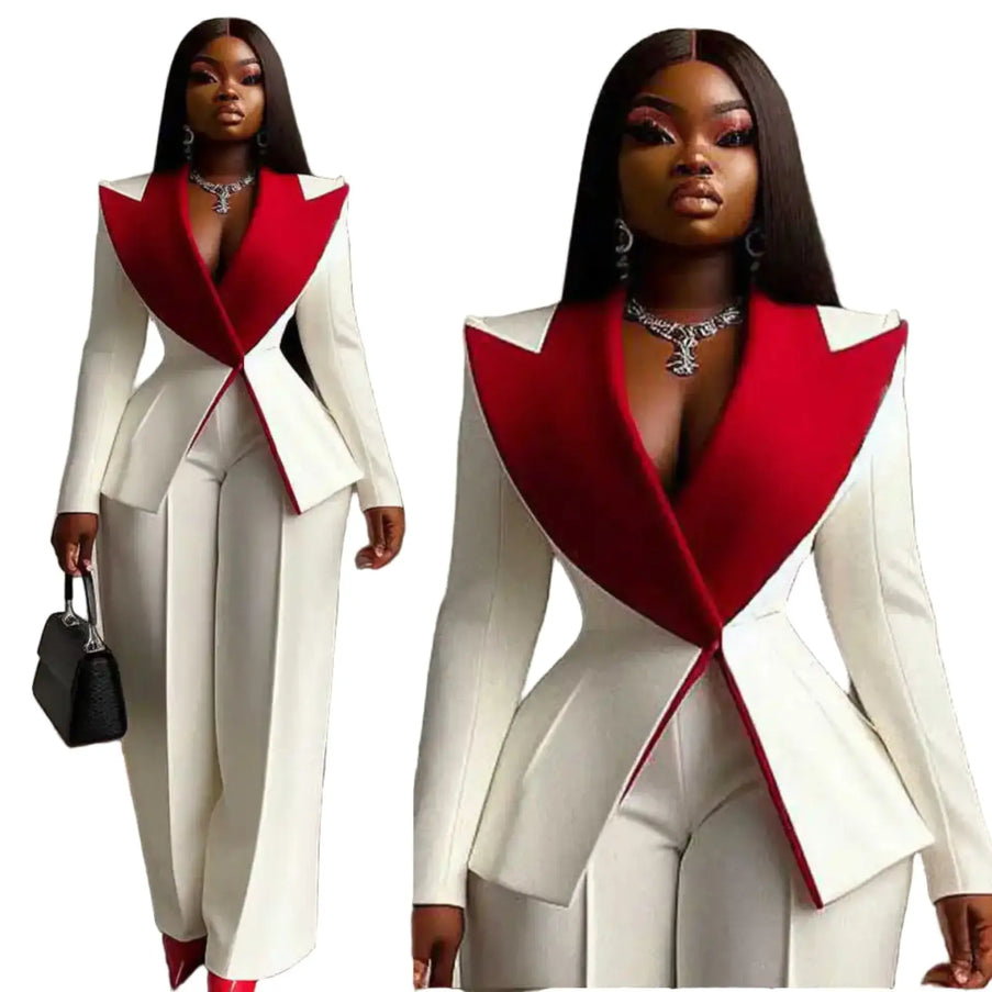 Woman wearing a white and red outfit with a matching handbag indoors.