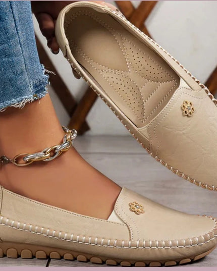 Comfortable women's loafers with laser stitch detail, perfect for casual streetwear and effortless style.