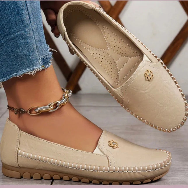 Comfortable women's loafers with laser stitch detail, perfect for casual streetwear and effortless style.