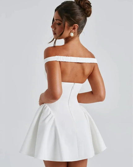 Elegant off shoulder mini dress party showcasing a white strapless A-Line design with a draped V-neck and flared skirt.