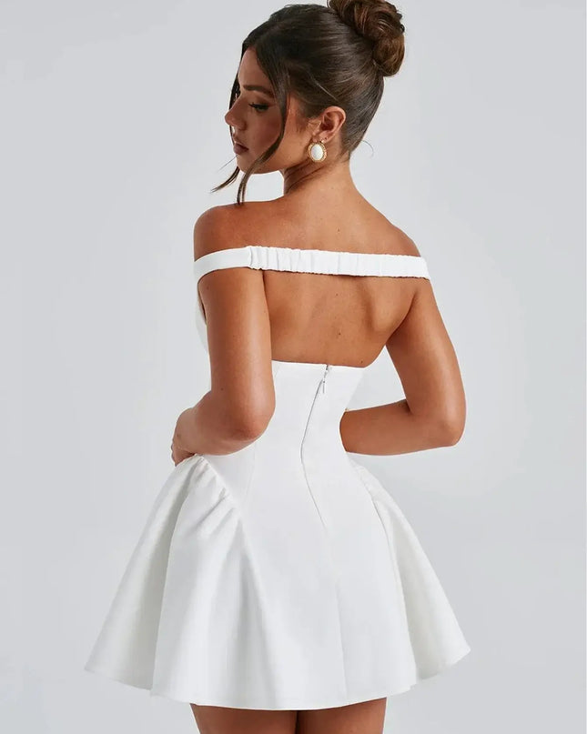 Elegant off shoulder mini dress party showcasing a white strapless A-Line design with a draped V-neck and flared skirt.