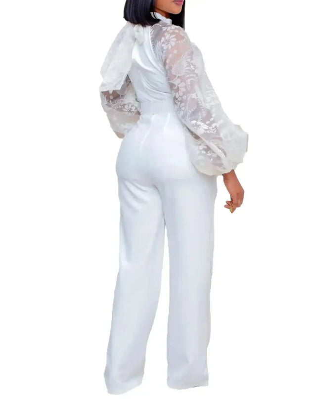 White outfit with sheer sleeves on a white background