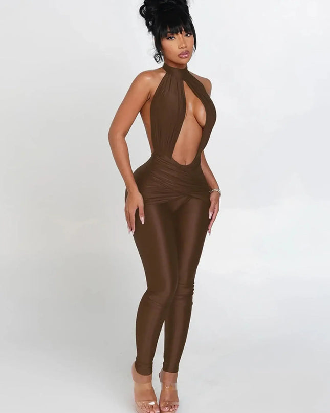Woman wearing a brown jumpsuit with a halter neck design on a white background