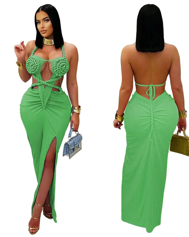Green dress with cut-out design worn by a model indoors.