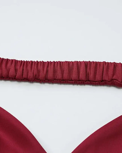 Close-up of the strapless design of an elegant off shoulder mini dress. Off shoulder mini dress party.