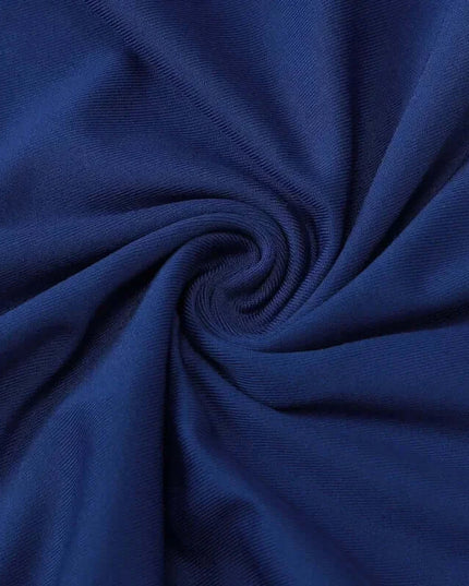 Close-up of navy fabric showcasing the soft texture and stretch perfect for a sexy strapless summer dress.