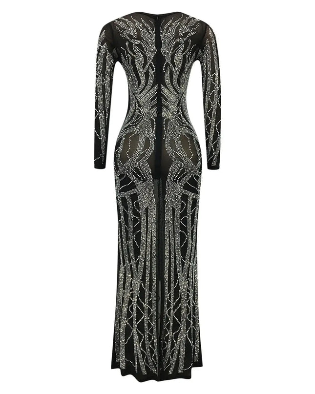 Black evening gown with silver embellishments on a white background