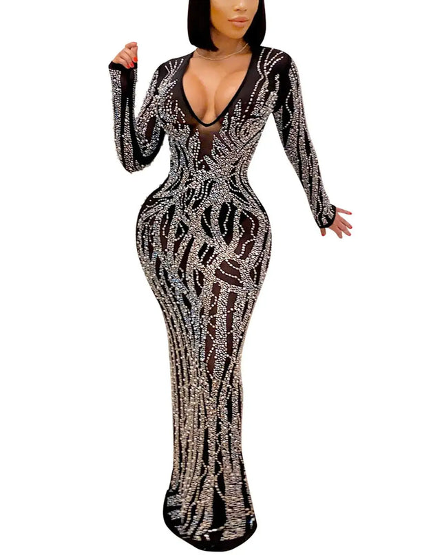 Black and silver patterned dress on a white background