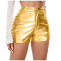 Gold metallic shorts worn by a person on a white background