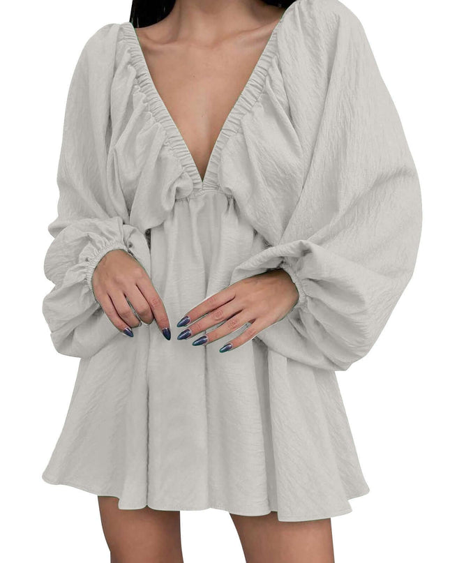 Light gray dress with long sleeves on a white background