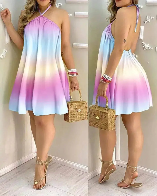 Tropical print halter neck dress showcasing a backless design in pastel gradient colors, perfect for spring and summer.