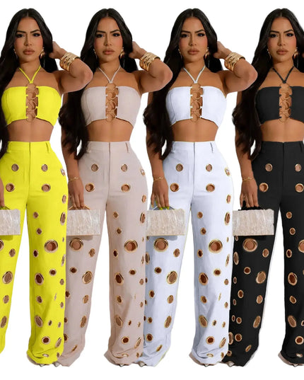 Four women wearing matching outfits with polka dot patterns on a white background